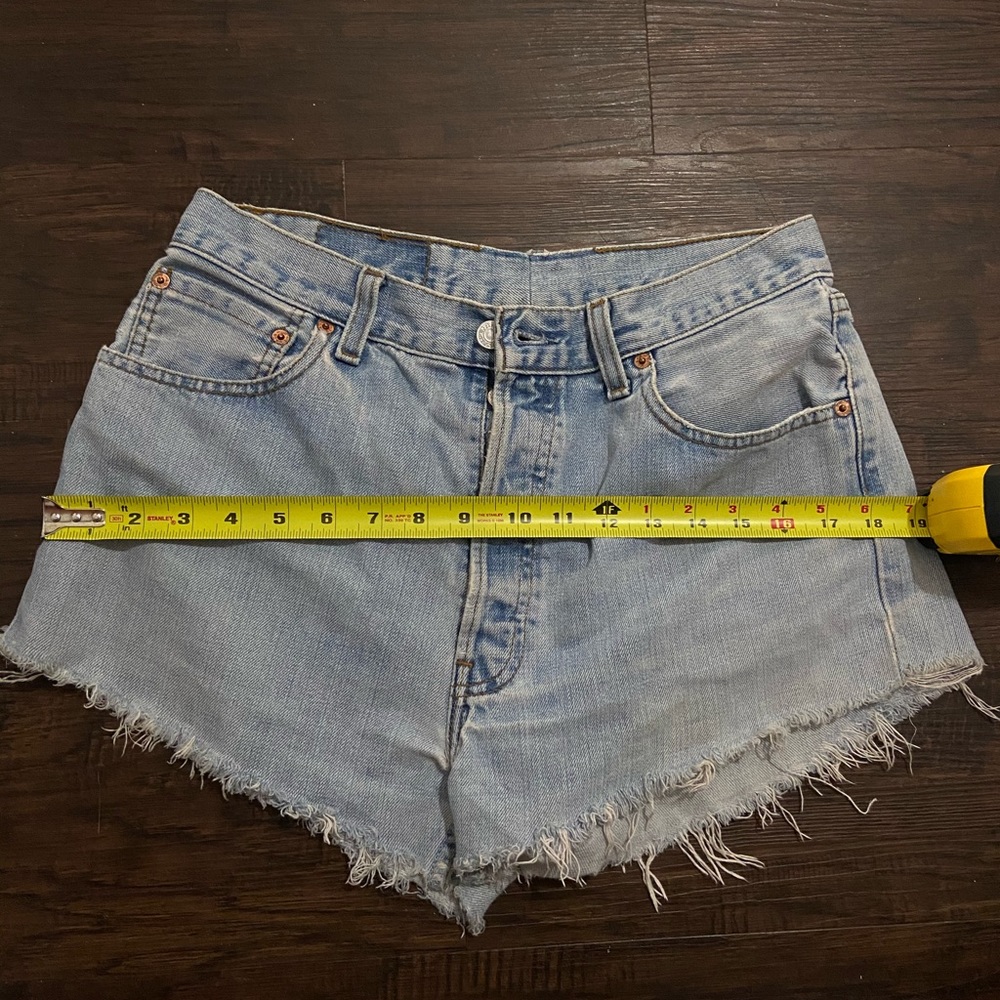 Levi 501 high waisted raw hem shorts